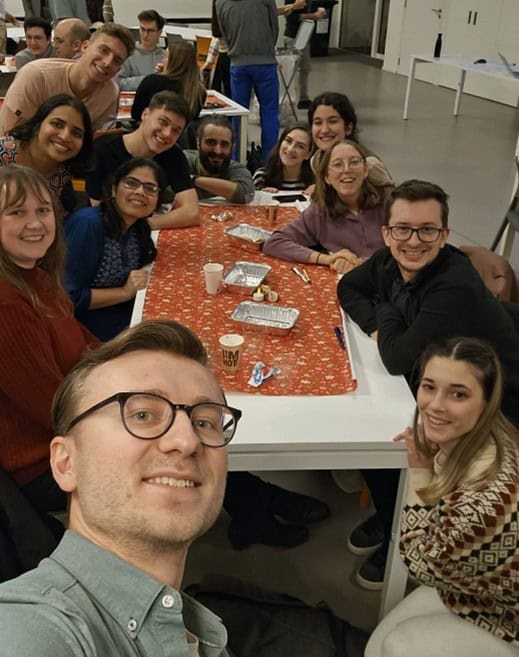 Members of the lab group (including Dora) out for a meal